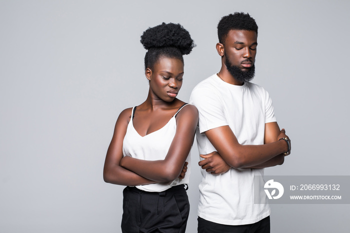 People, relationship difficulties, conflict and family concept - unhappy african couple having argument isolated on white background