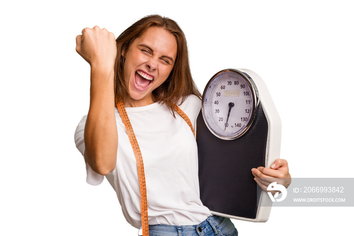 Young nutritionist caucasian woman holding scale and mesure tape isolated