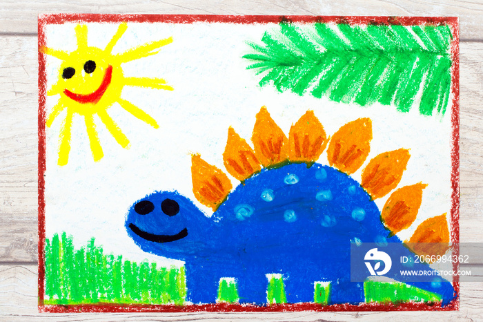 Photo of colorful drawing: Smiling dinosaur. Big blue stegosaurus.