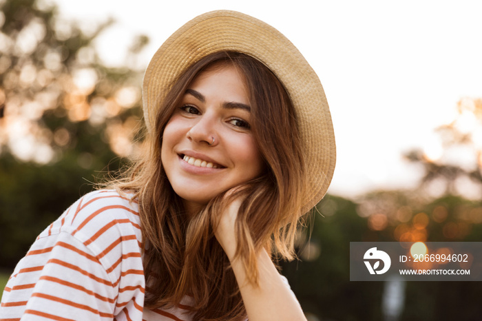 Close up of lovely young girl in summer hat