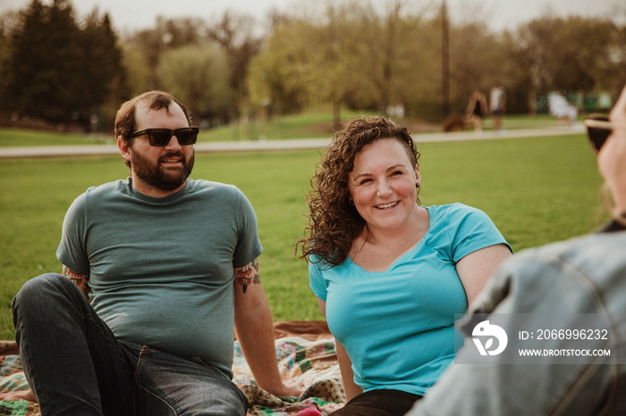 group of friends having fun in park