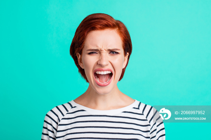 Close-up portrait of pretty attractive sad red-haired lady wearing striped pullover crying opened mouth isolated over bright vivid shine green turquoise background