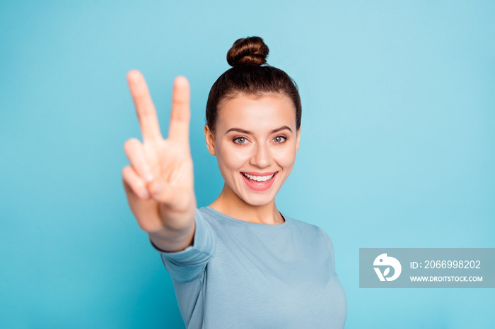 Close up photo of pretty attractive charming lady millennial have weekend vacation holiday enjoy feel content glad isolated wear modern outfit make v-signs on colorful background