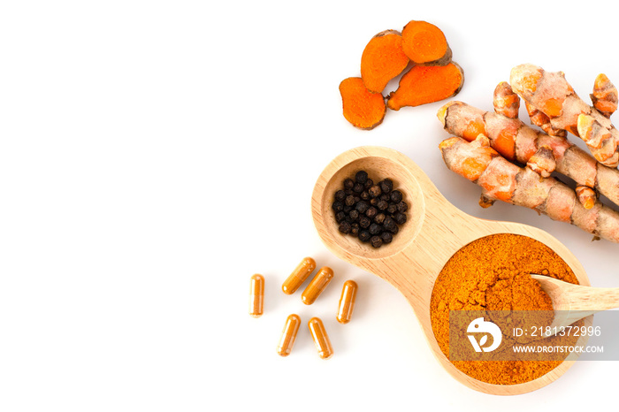 Curcumin powder, Turmeric root with slices, Curcuma capsules and black pepper isolated on white background.