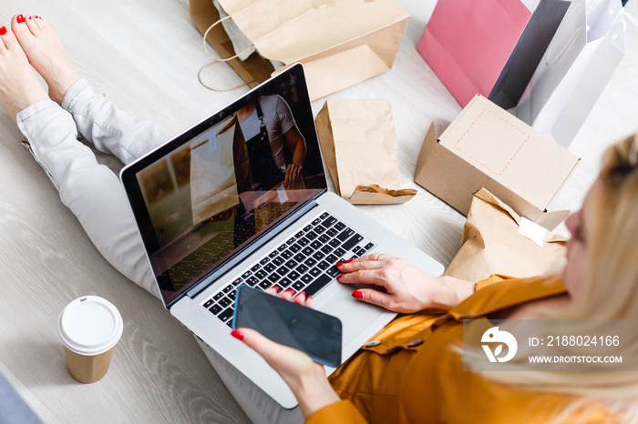 Close up woman sitting use credit card pay for food online order on laptop computer in add to cart f