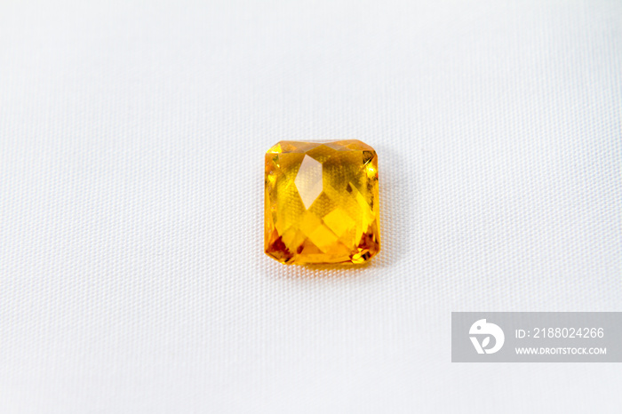 Yellow sapphire with white isolated background