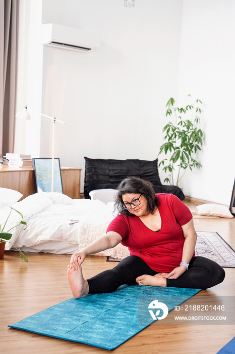 Group of friends meditating and doing yoga at home