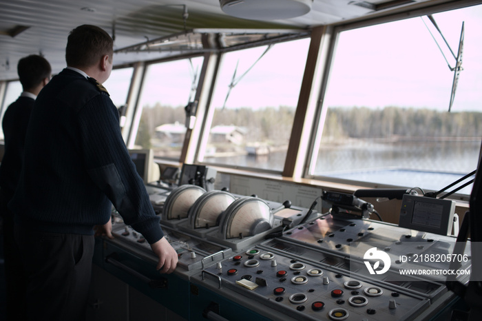 Navigation officer driving cruise liner