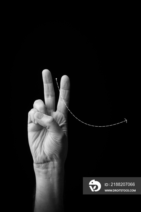 Hand demonstrating the Japanese sign language letter ’RI’ or ’り’ with copy space