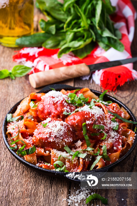 Homemade  traditional Italian pasta pappardelle with meatballs