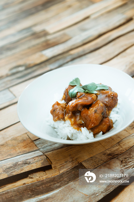 Asian style caramel pork with rice and vegetable