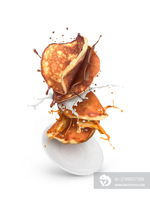 pancakes falling with chocolate, caramel and milk splash  isolated