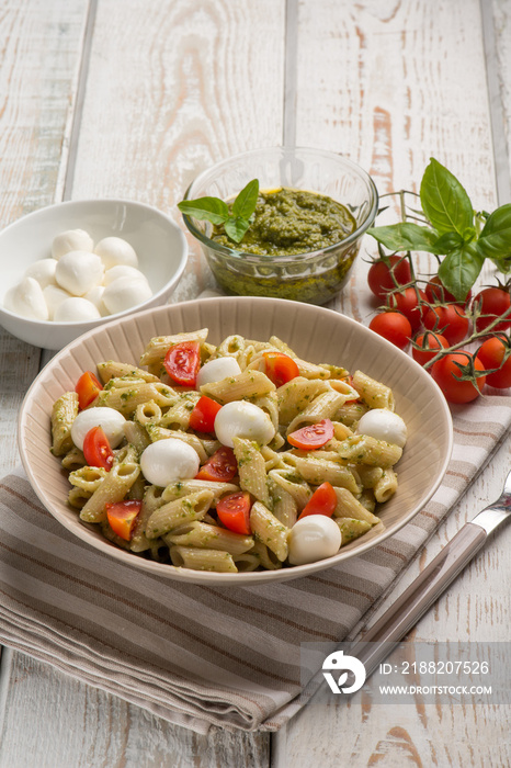 cold pasta salad with mozzarella and pesto sauce