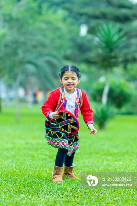 Peruvian girl dressed in typical costume of Cusco, Peru