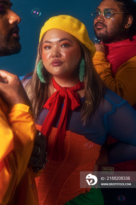 Asian trio colour blocked studio portrait