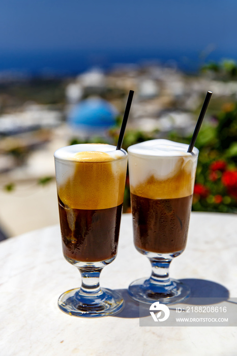 Two glasses of Greek frappe.