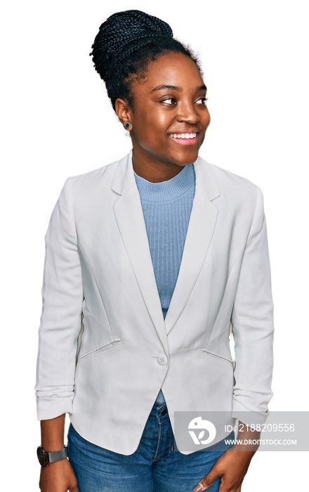 Young african american woman wearing business clothes looking away to side with smile on face, natural expression. laughing confident.