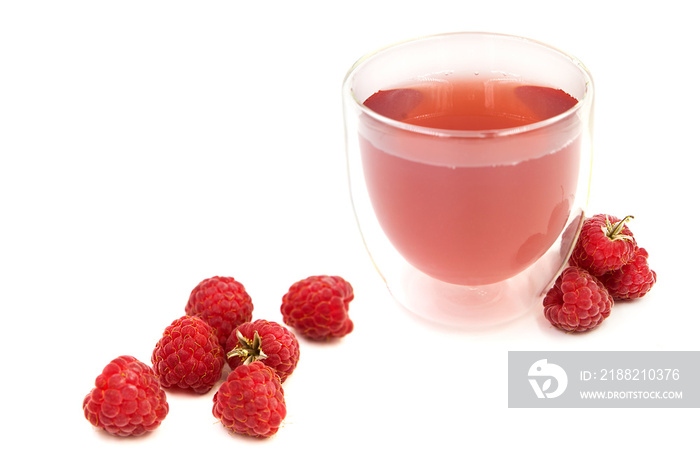 Transparent glass with double bottom filled with raspberry tea isolated on white background.