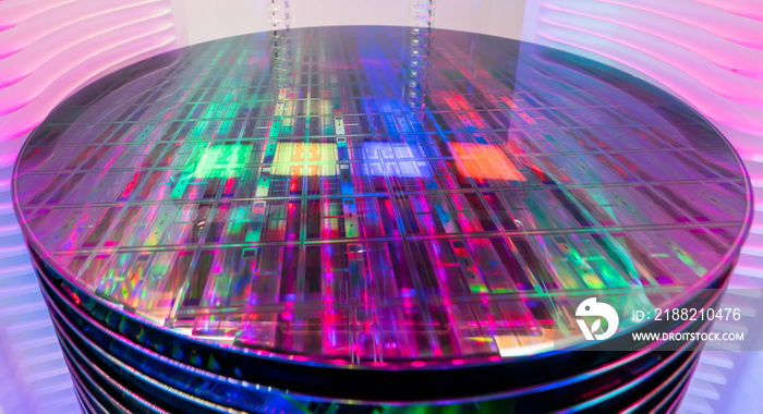 patterned silicon wafers in a universal pod. Electronic circuit designs have been built onto the wafers using micromaching including photolithography