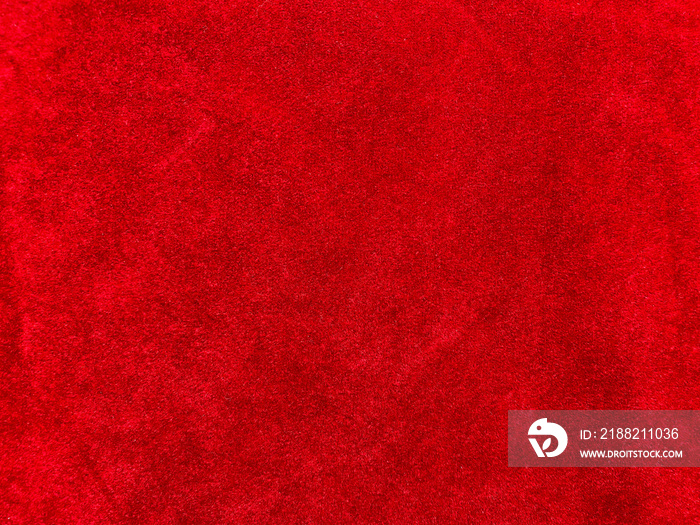 Dark red velvet fabric texture used as background. Empty dark red fabric background of soft and smooth textile material. There is space for text..