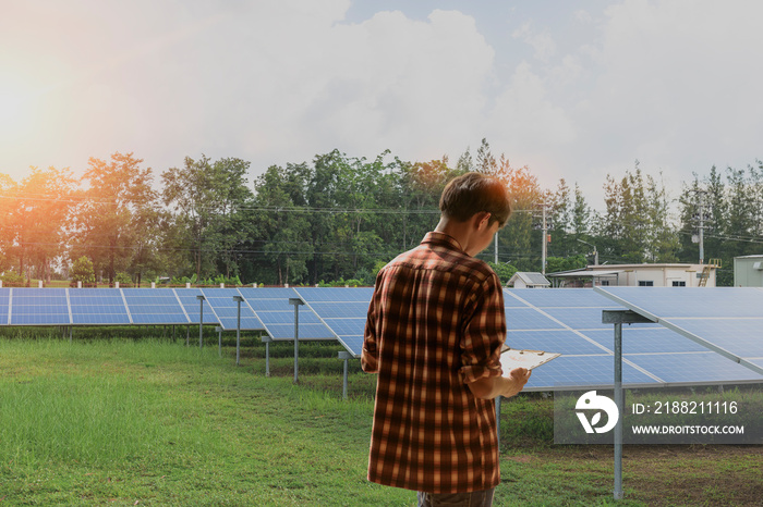 Engineers are working on equipment inspection and maintenance in the solar energy industry. Engineers plan to find the problem of the solar panel.