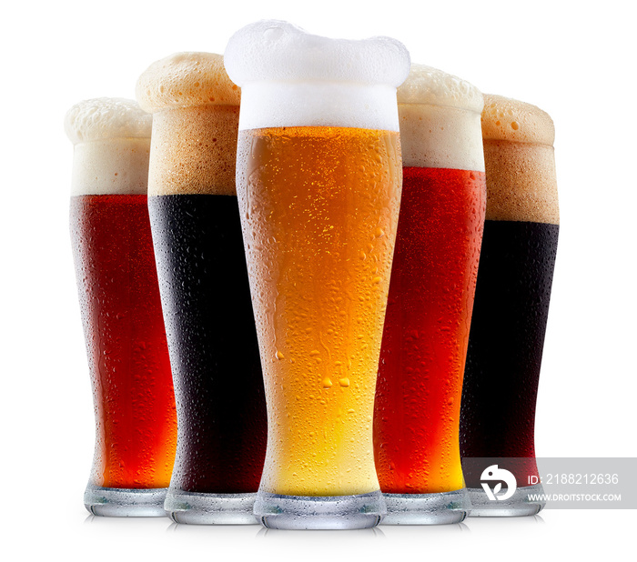 Mug collection of frosty dark red and light beer with foam isolated on a white background