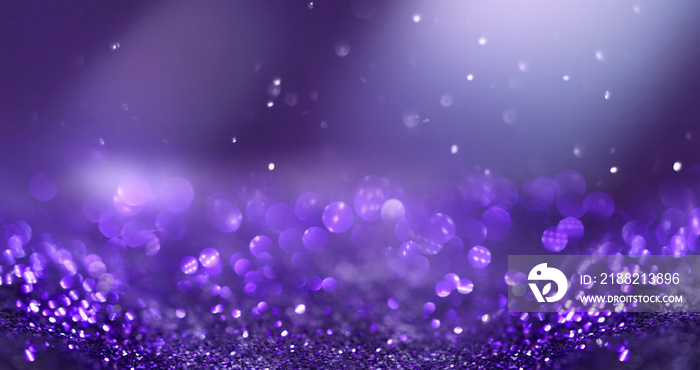 Glitter background dark purple saturated color ,de-focused, macro. Sequins fall and sparkle, free space.