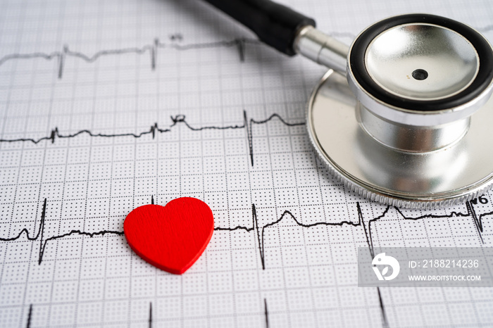 Stethoscope on electrocardiogram  ECG with red heart, heart wave, heart attack, cardiogram report.