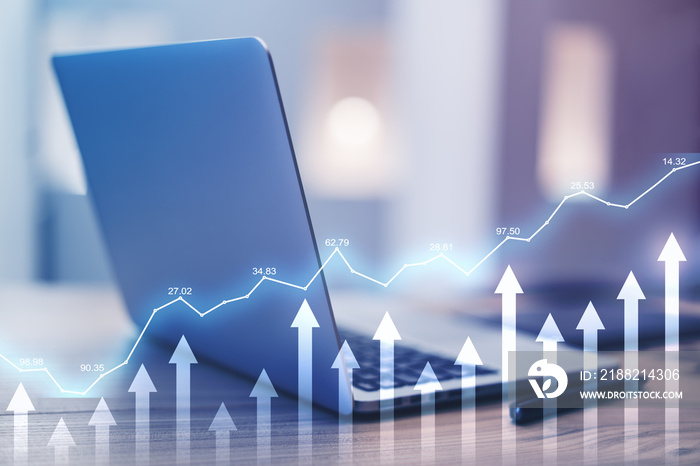 Stock market increase concept with opened laptop and digital arrows and financial diagram