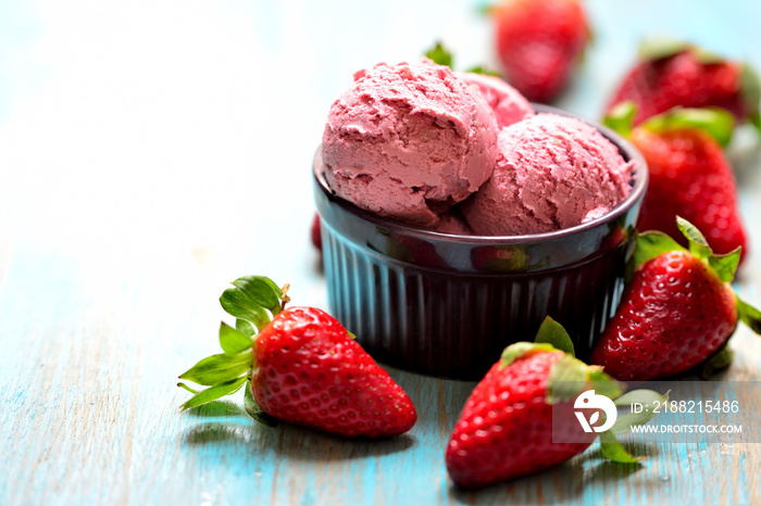 Strawberries and ice cream in a bowl