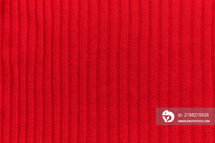 piece of a red wool fabric with stripes and lines