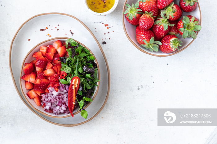 Ingredients for making strawberry salsa