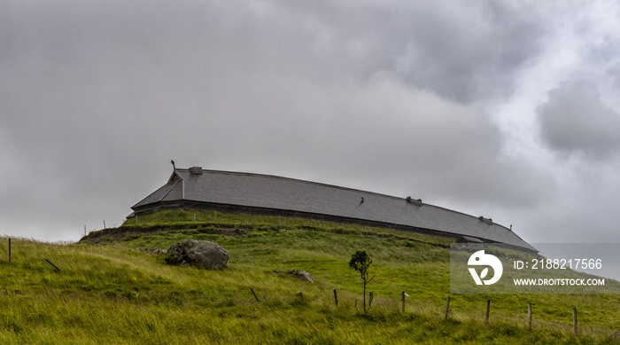 view of the Lofoten Viking Musuem near Flakstad on an overcast and rainy summer day