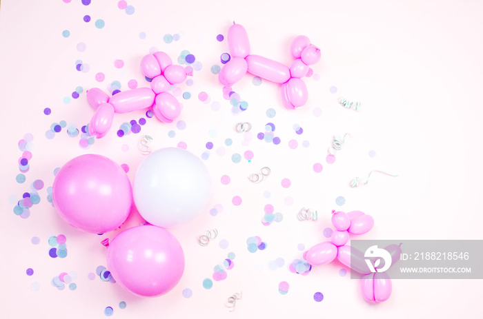 Festive light background with balloons and confetti.