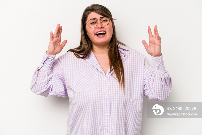 Young caucasian overweight woman isolated on white background laughs out loudly keeping hand on chest.