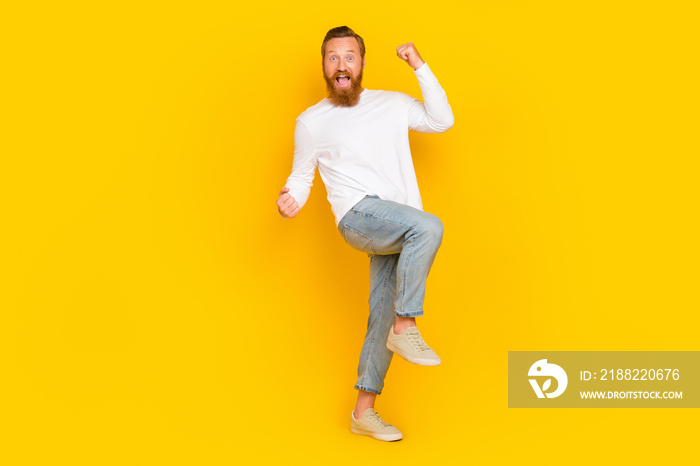 Full body photo of hooray beard man yell wear white shirt jeans boots isolated on yellow color background