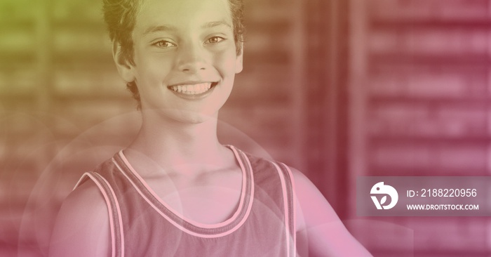 Composition of smiling schoolboy basketball player with green to pink tint