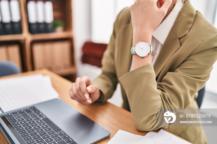 Young blonde woman business worker working at office