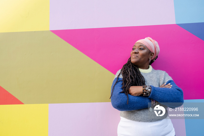 Portrait of beautiful woman on colorful background