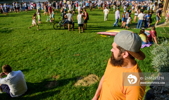 Open air concert. City day. Music festival. Book ticket now. Entertainment concept. Visit summer festival. Guy celebrate holiday or festival. Summer fest. Man bearded hipster in front of crowd