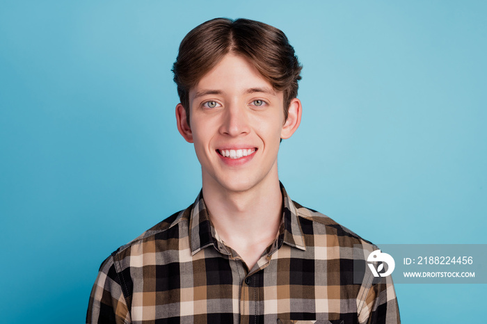 Photo of cheerful young guy happy positive smile fun toothy smile veneers stomatology isolated on blue color background