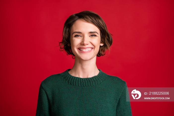 Photo of attractive charming happy young woman beaming smile good mood isolated on red color background