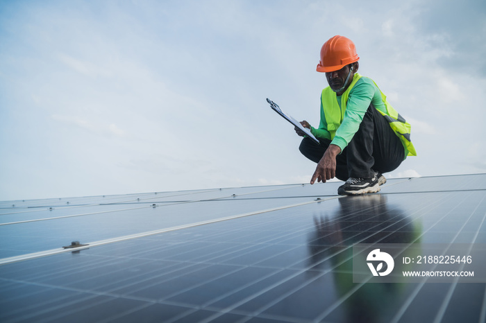 engineer working on maintenance panel in solar power plant