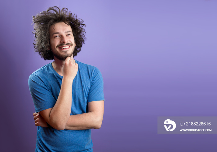 Beautiful man in front of a colored background