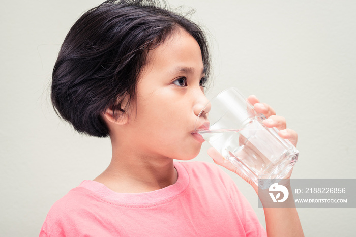 Thai Child Drinking Water