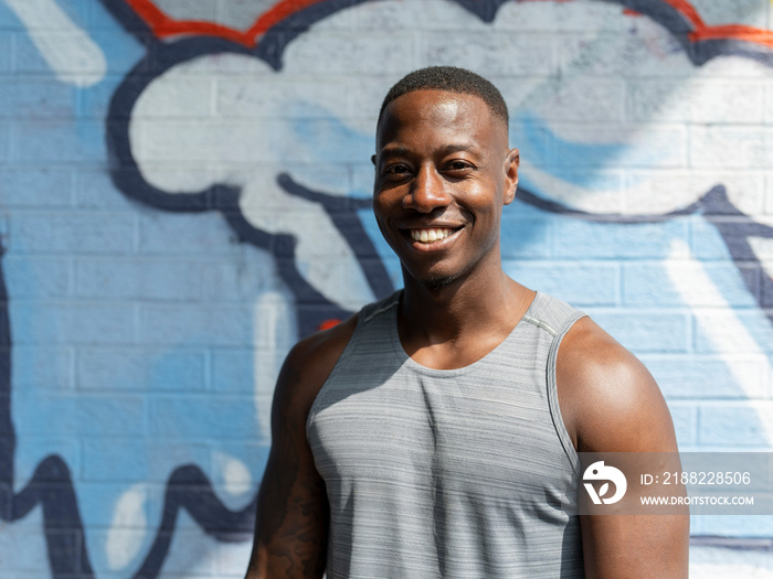 Portrait of muscular man in sports clothing