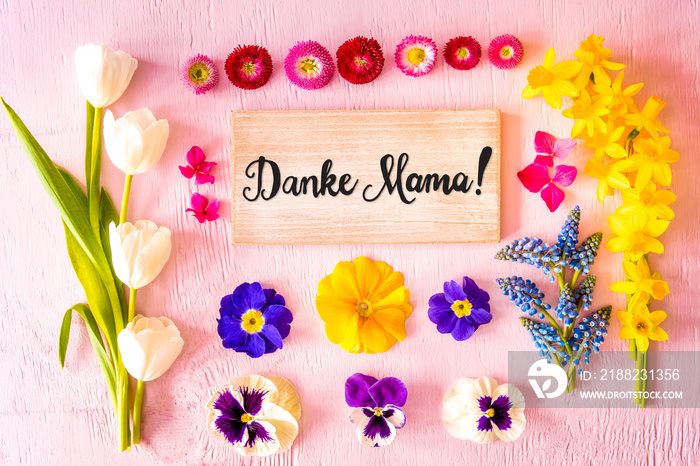 Rustic Wooden Sign With German Calligraphy Danke Mama Means Thank You Mom. Flat Lay With Spring Flower. Wooden Pink Background