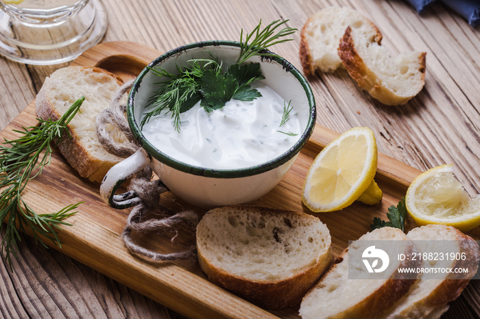 Yogurt dip with parsley and dill, vegetarian snack meal