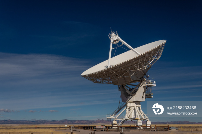 Very Large Array VLA radio antenna dish on pad in the New Mexico desert listening to the cosmos, horizontal aspect