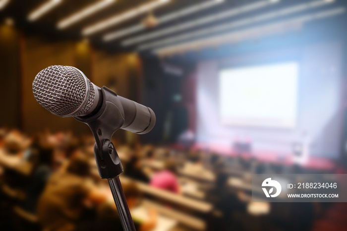 Microphone over the blurred business forum Meeting or Conference Training Learning Coaching Room Concept, Blurred background.